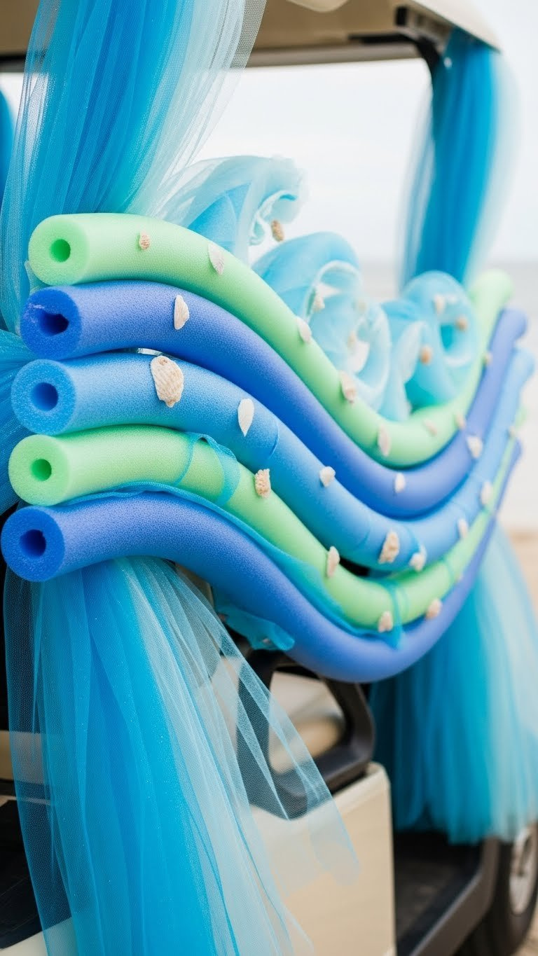 Blue Tulle Fabric Draped Over Pool Noodles Creating Flowing Ocean Waves On Golf Cart Side Decor